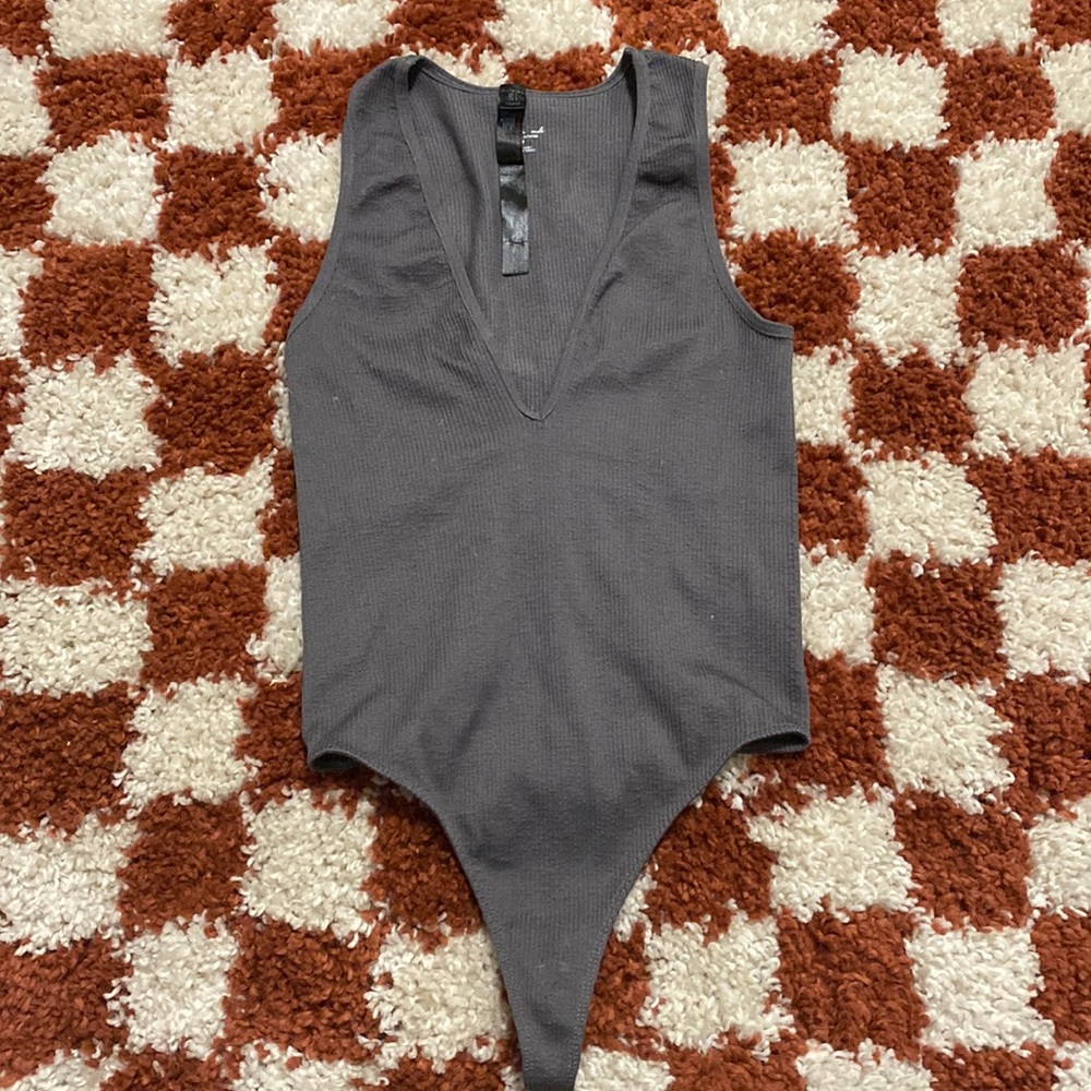 Gray body-con bodysuit